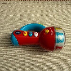 VTech Spin Learn Color Flash Light Teaches Colors, Numbers, and Musical Songs
